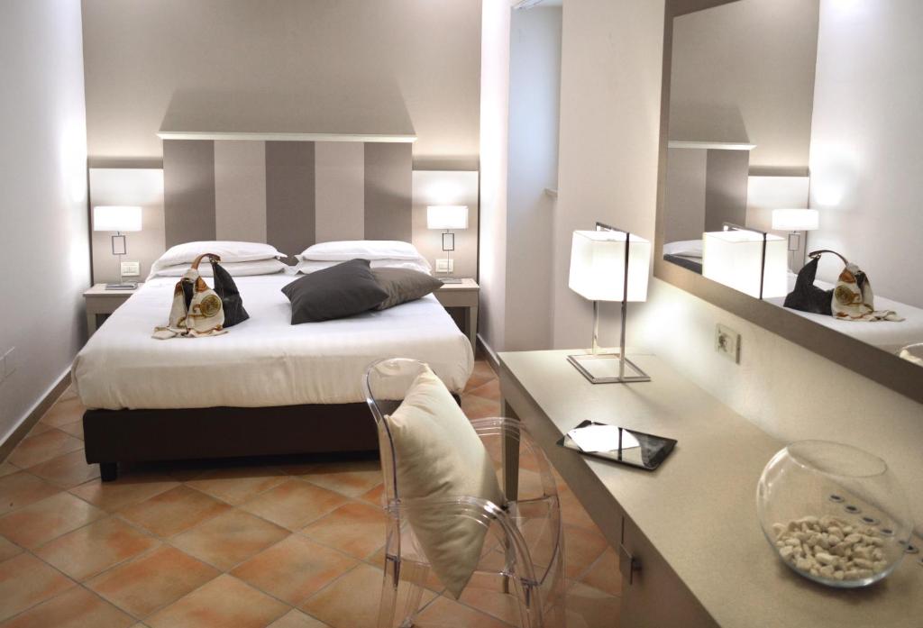 Postel nebo postele na pokoji v ubytování Hotel Gajeta