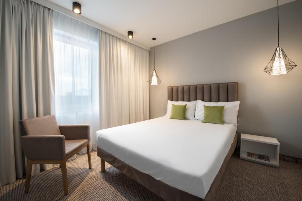 Posteľ alebo postele v izbe v ubytovaní ibis Styles Siedlce