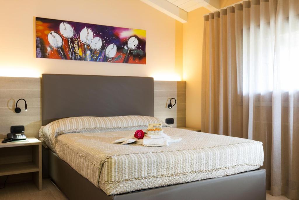 Postel nebo postele na pokoji v ubytování Hotel Prata Verde
