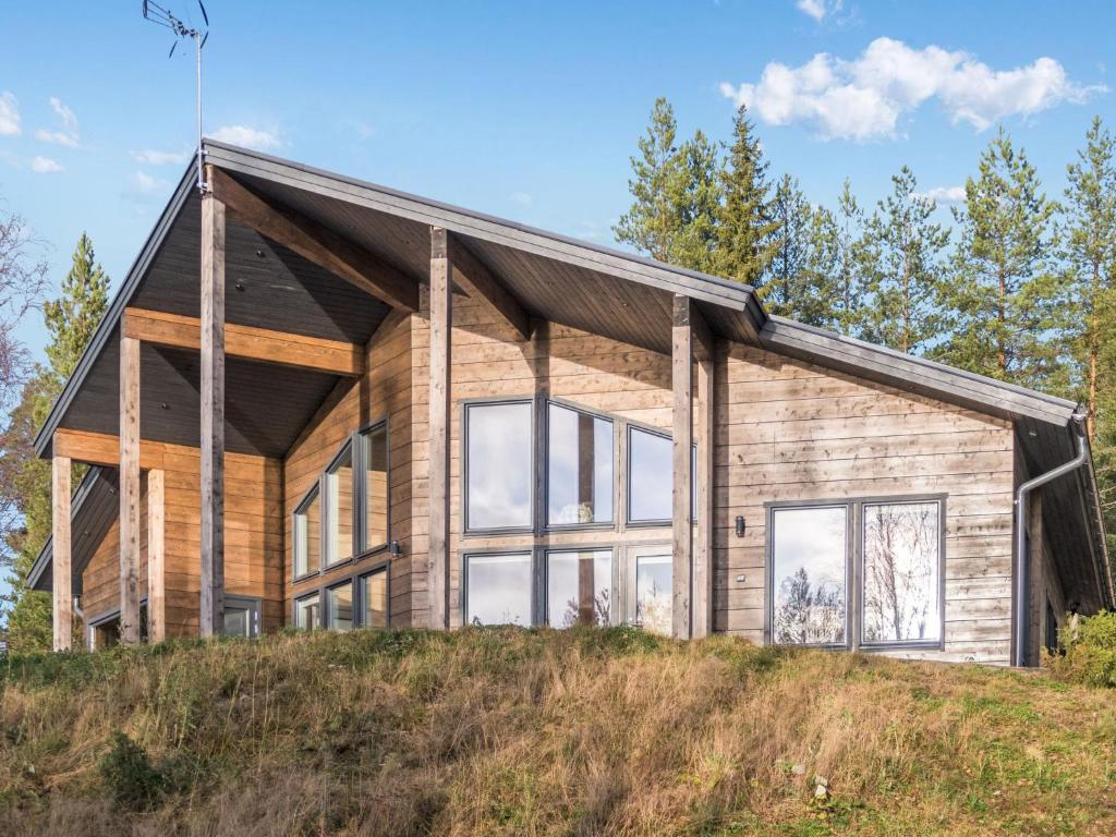 a house on top of a hill at Holiday Home Leinola by Interhome in Sotkamo