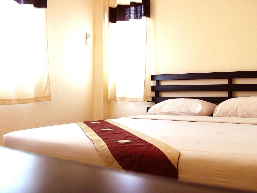 Postel nebo postele na pokoji v ubytování River Resort & Spa