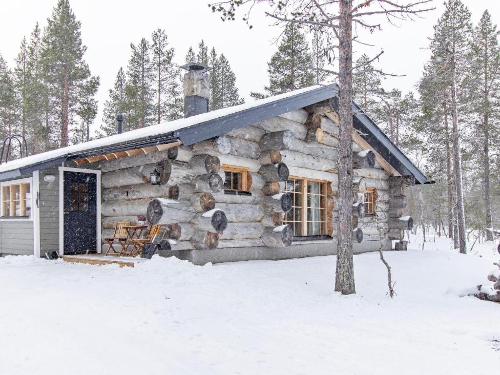 a log cabin in the snow at Holiday Home Luppokelo by Interhome in Saariselka