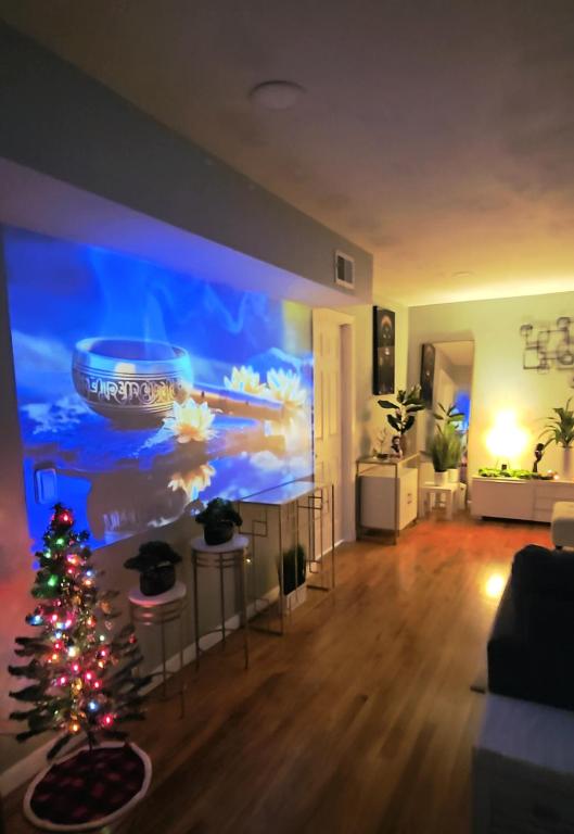 a living room with a christmas tree in a room at Casa BOUTIQUE in Linden