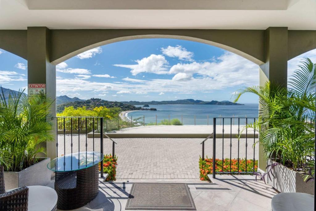 Photo inspiration: Fresh Look at Luxury Condo With Panoramic Ocean Views Sparkling Infinity Pool And