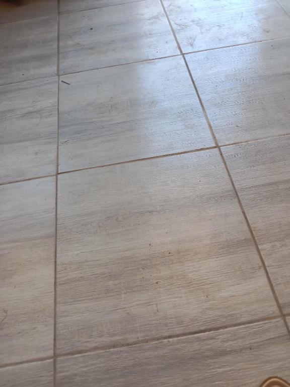 a wooden floor in a room with wooden floors at Rest Easy in Grasmere