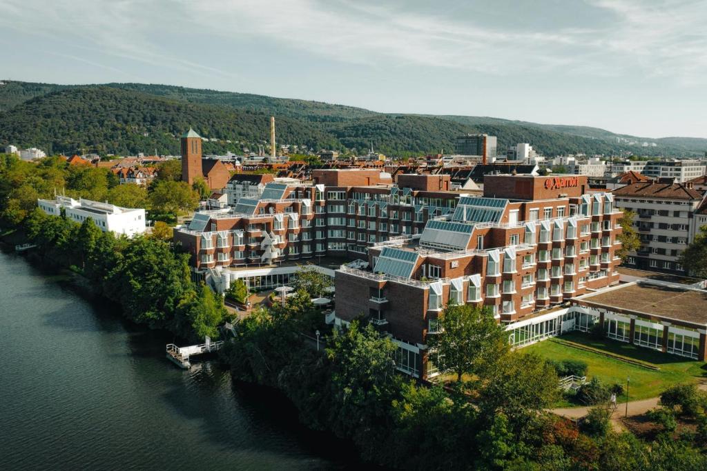 an aerial view of a city next to a river at Heidelberg Marriott Hotel in Heidelberg