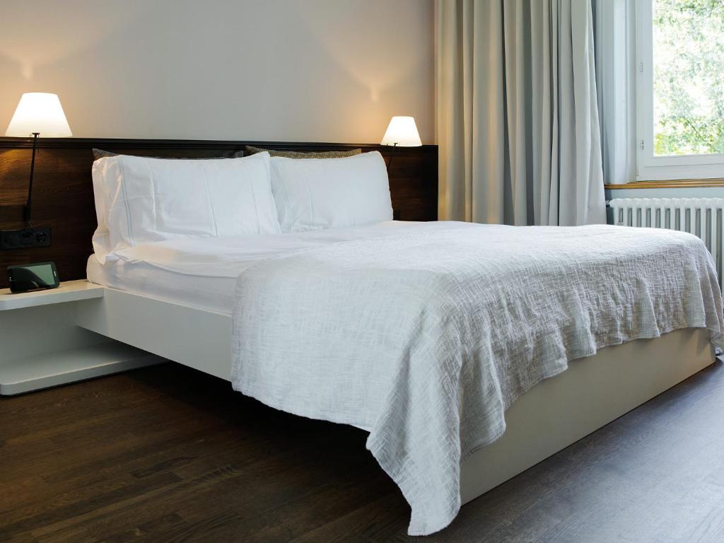 Llit o llits en una habitació de Design Hotel Plattenhof