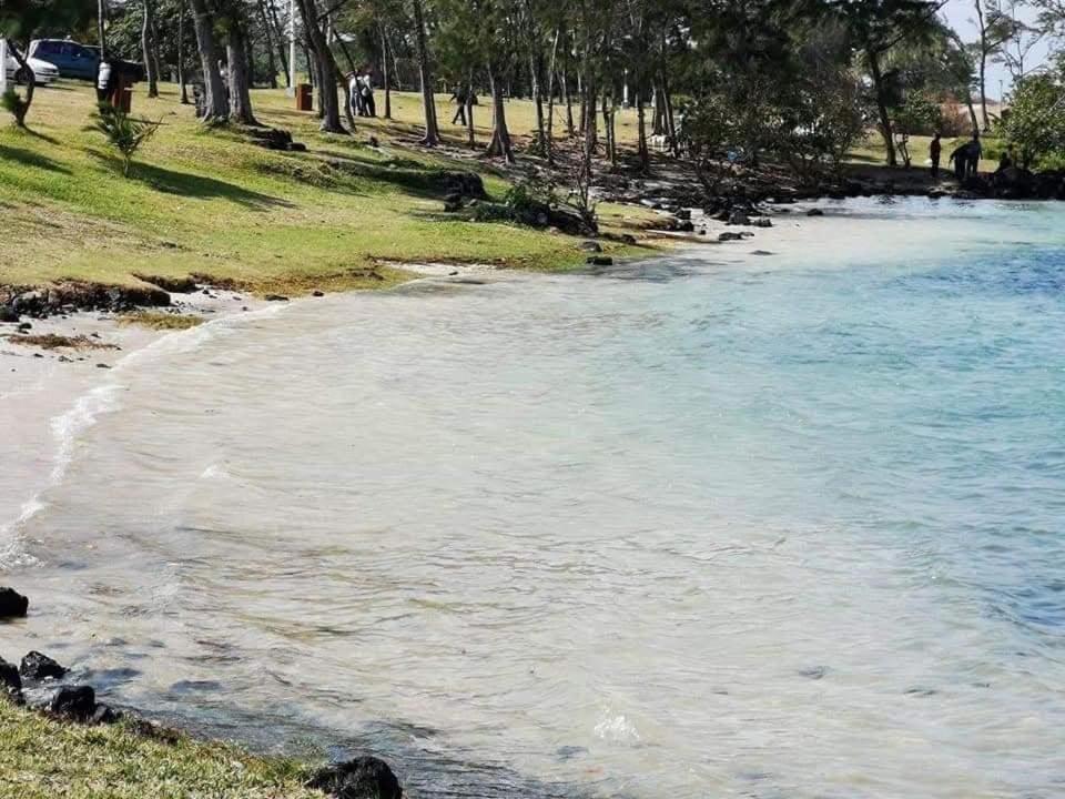 a beach with a body of water at La Terrace Brocus in Bouchon