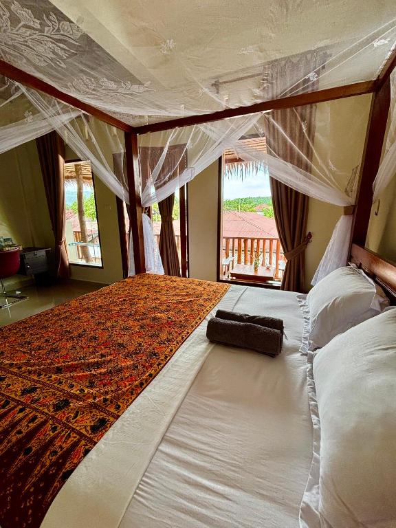 Sumatran Ethical Expeditions and Trekking - Zimmer Mit Kingsize-Bett Und Balkon