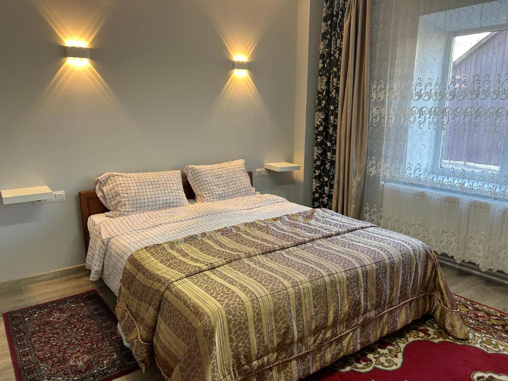 Ліжко або ліжка в номері Casa Bianca