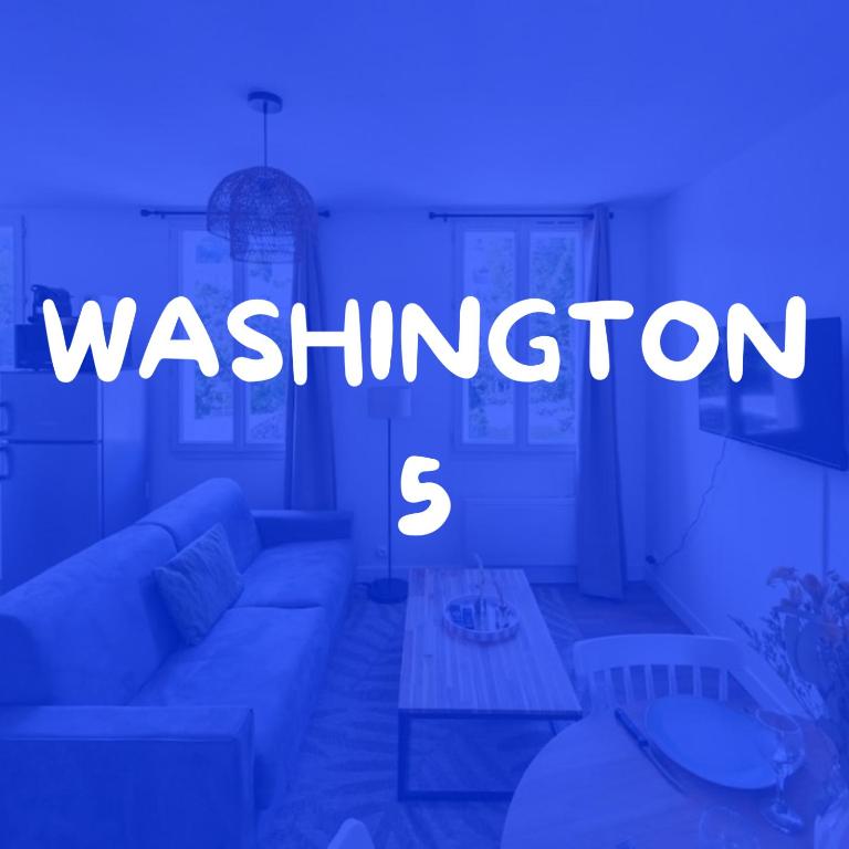 a living room with a couch and a blue light at Appartement - Washington 5 in Le Havre