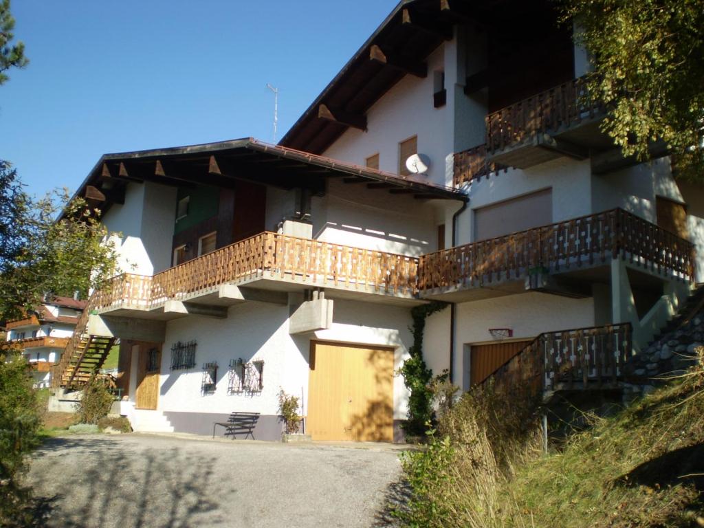 a building with balconies on the side of it at CasaInesAldo in Candide