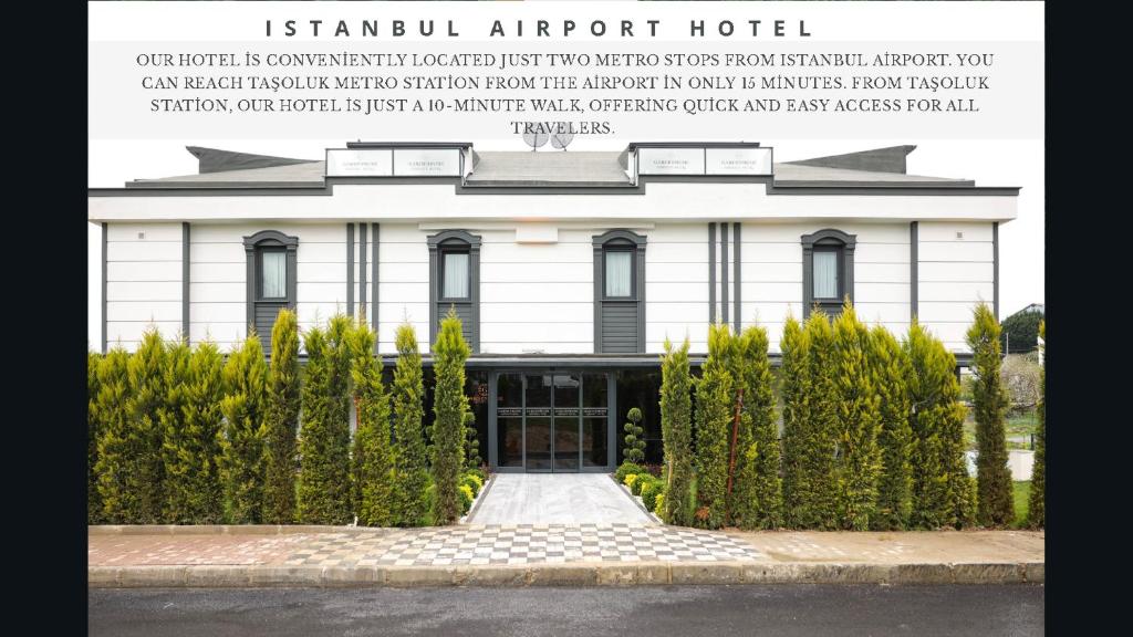 a white building with a sign that reads istanbul airport hotel at Gardenmode Airport Hotel in Taşoluk