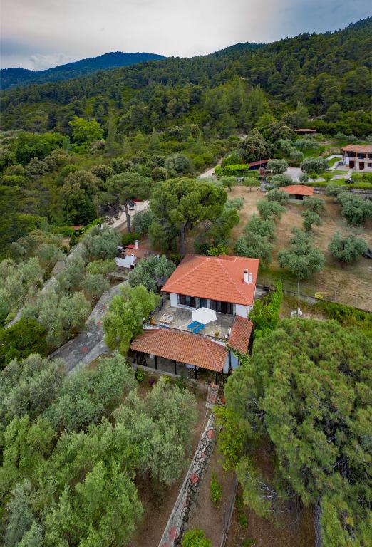 an aerial view of a house in a forest at Sea View Traditional Villa in Vourvourou