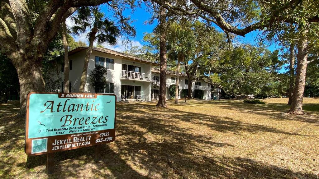 a sign in front of a house at Atlantic Breeze #8 in Jekyll Island