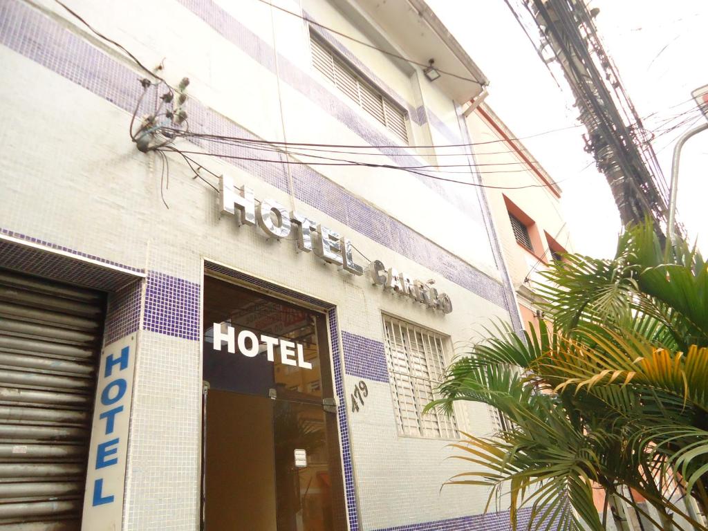 a hotel sign on the side of a building at Hotel Carrão in Sao Paulo