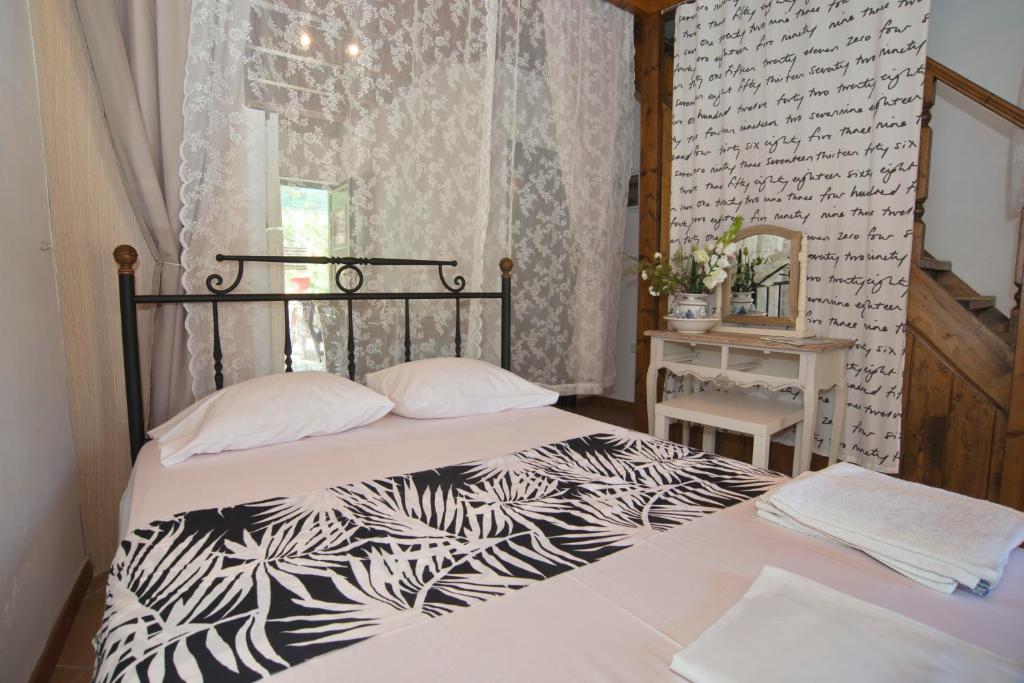Postel nebo postele na pokoji v ubytování Nandia Studio & Apartment