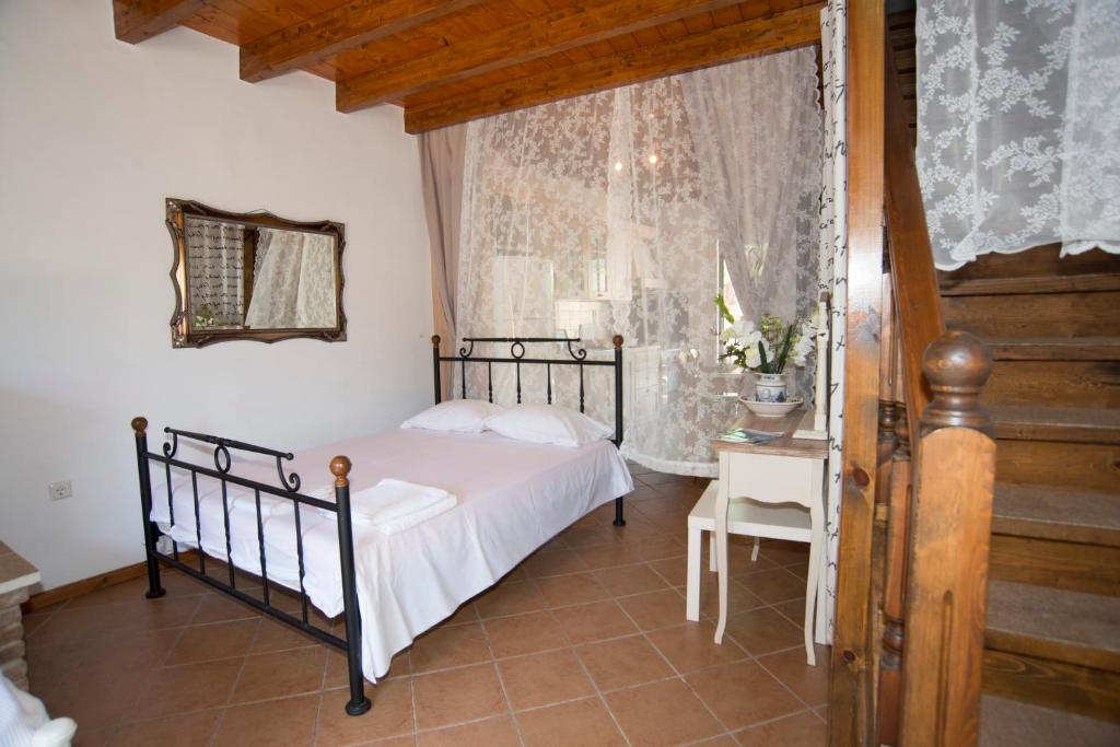 Postel nebo postele na pokoji v ubytování Nandia Studio & Apartment