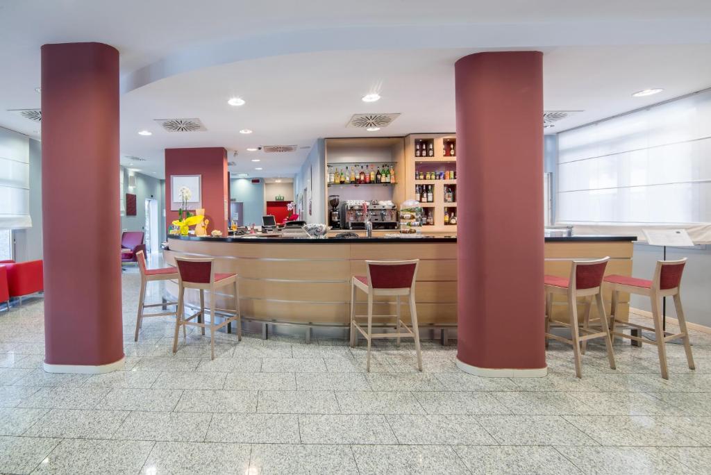 The lounge or bar area at Idea Hotel Torino Mirafiori