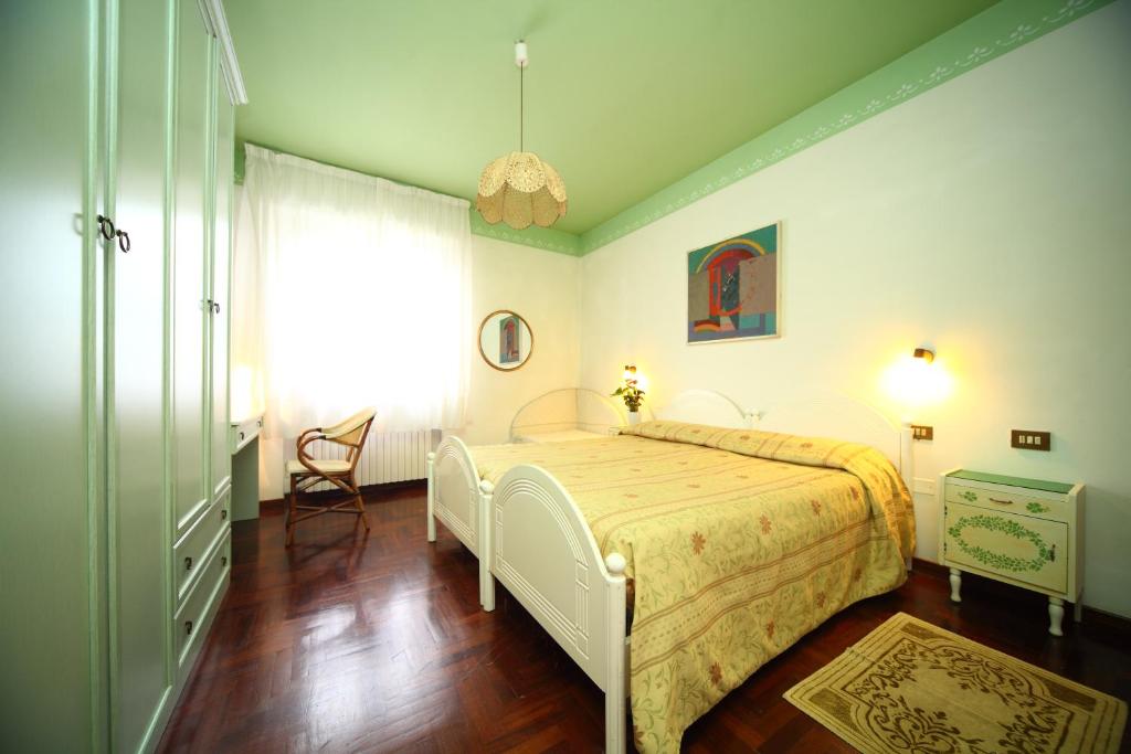 Postel nebo postele na pokoji v ubytování B&B Francesco in Assisi