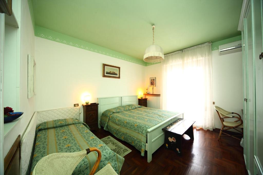 Postel nebo postele na pokoji v ubytování B&B Francesco in Assisi