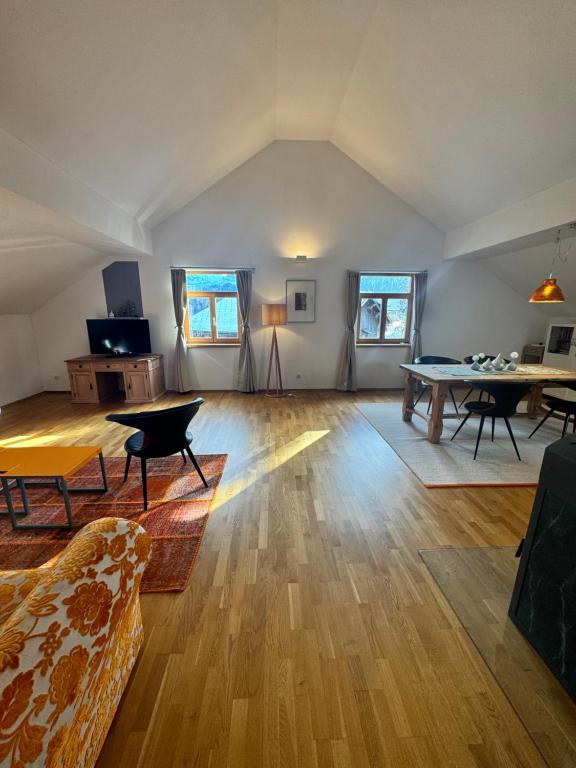 a large living room with a ping pong table in it at Premium Apartment - großzügig & zentral wohnen in Schwarzenberg