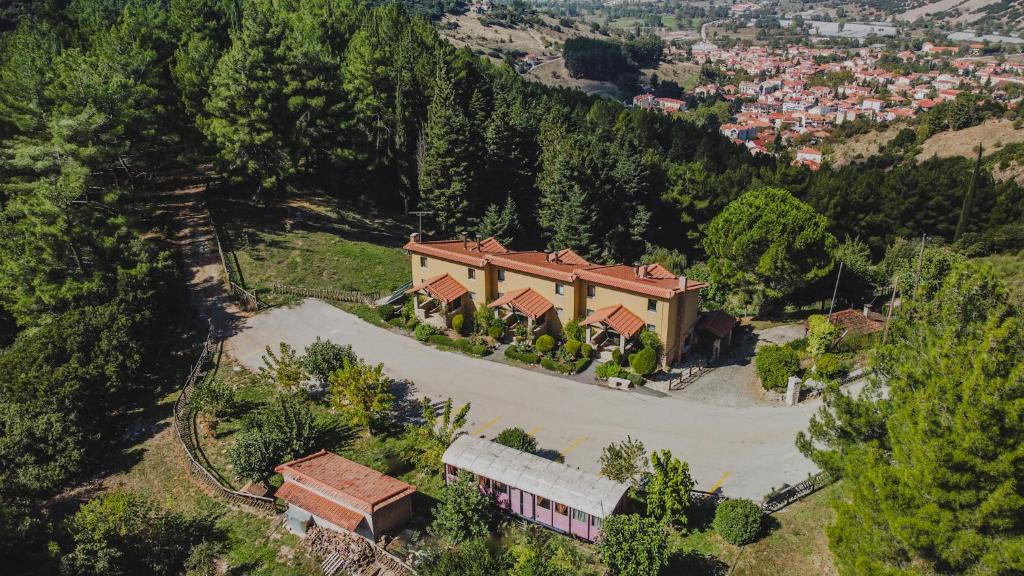 an aerial view of a house on a mountain at Aphrodite's Inn Kalavrita in Kalavrita