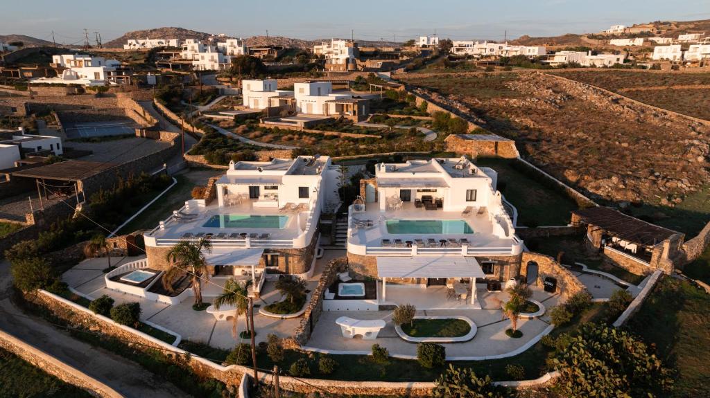 an aerial view of a large white mansion at Princess Villas Oasis Mykonos in Kalafatis