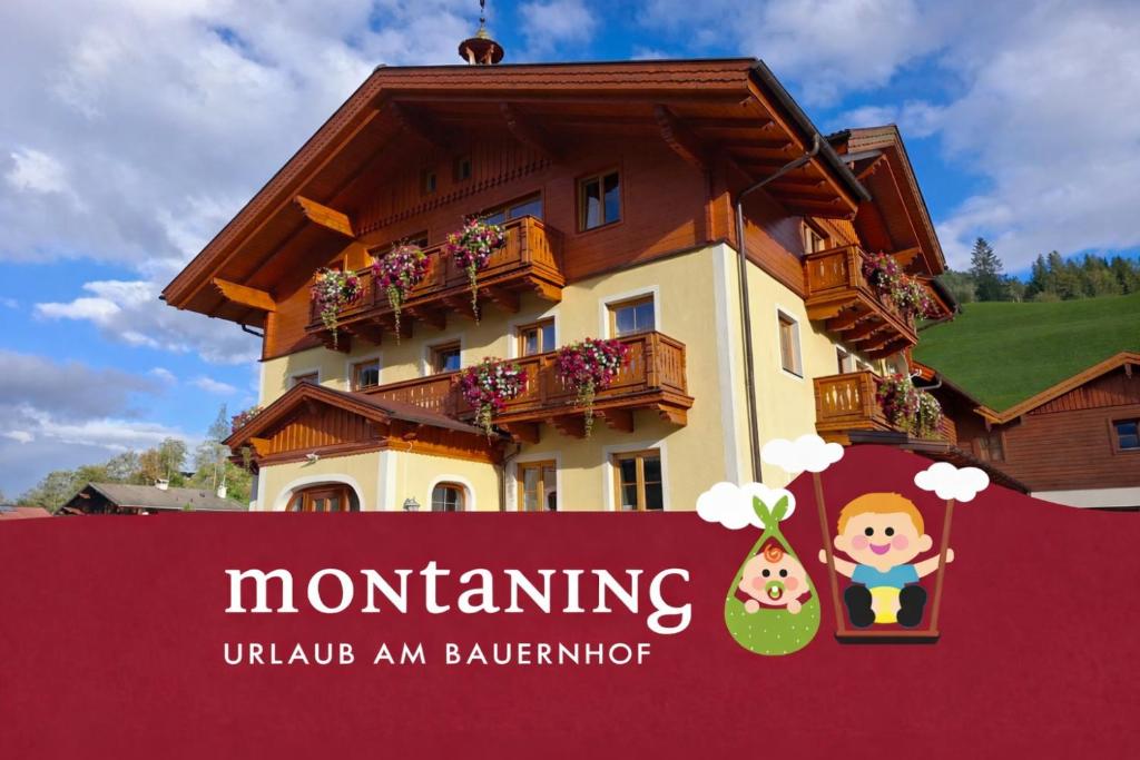 a building with a sign in front of it at Baby- und Kinderbauernhof Montaning in Forstau