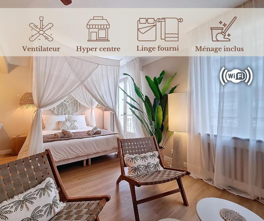a bedroom with a bed and a chair in a room at La Suite BALI, Charme et Confort, Hyper centre in La Roche-sur-Yon