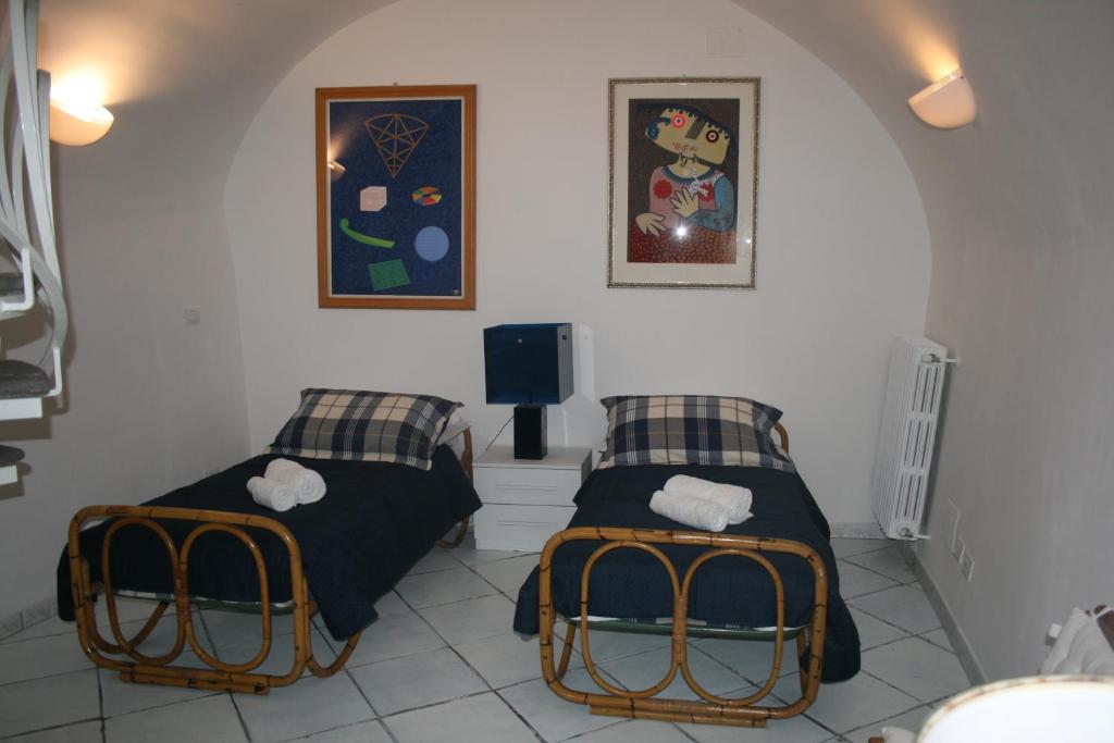 A bed or beds in a room at Foro Romano Apartments A