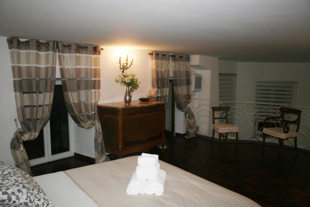 A bed or beds in a room at Foro Romano Apartments A