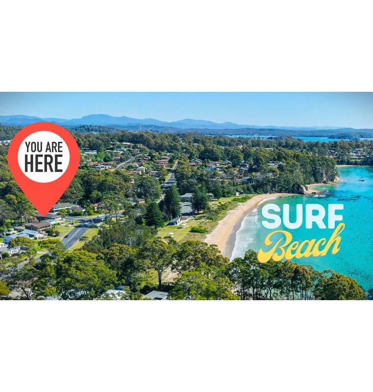 an image of a beach with a red heart and a surf beach sign at Beach House in Surf Beach