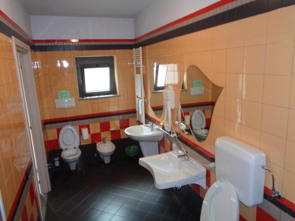 Koupelna v ubytování Hotel Airone