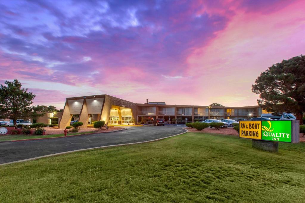 a hotel with a sign in front of a building at Scenic View Inn - Lake Powell - Page AZ in Page