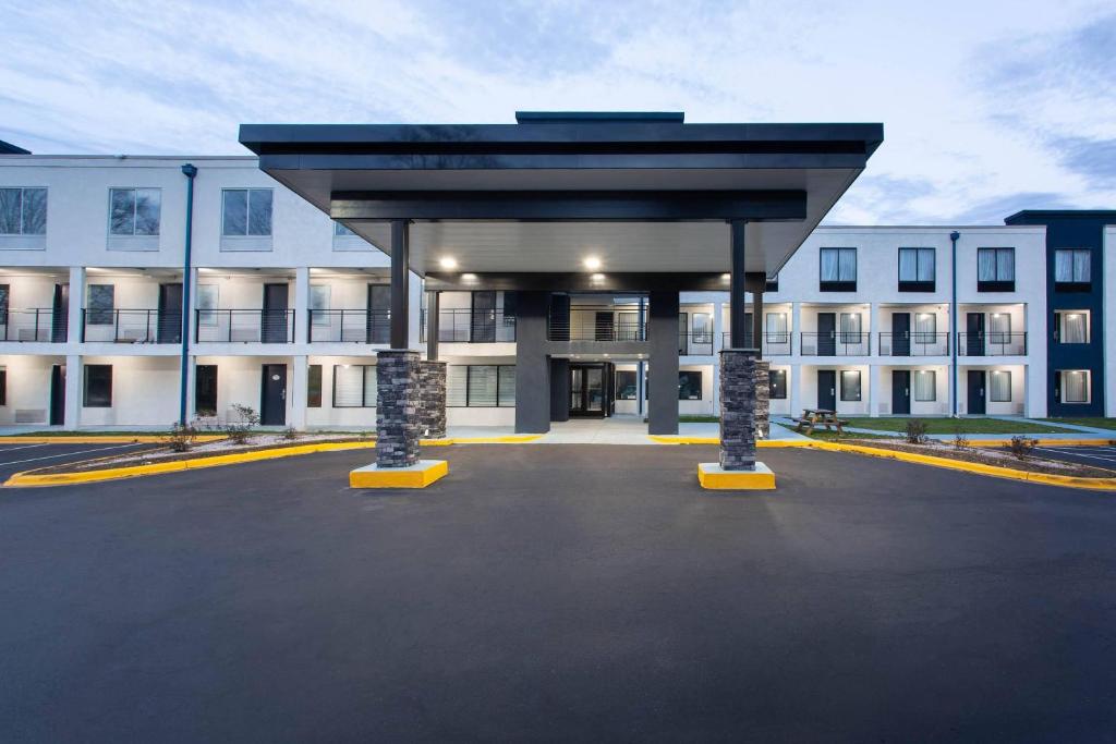an empty parking lot in front of a building at Clarion Pointe in Charlotte