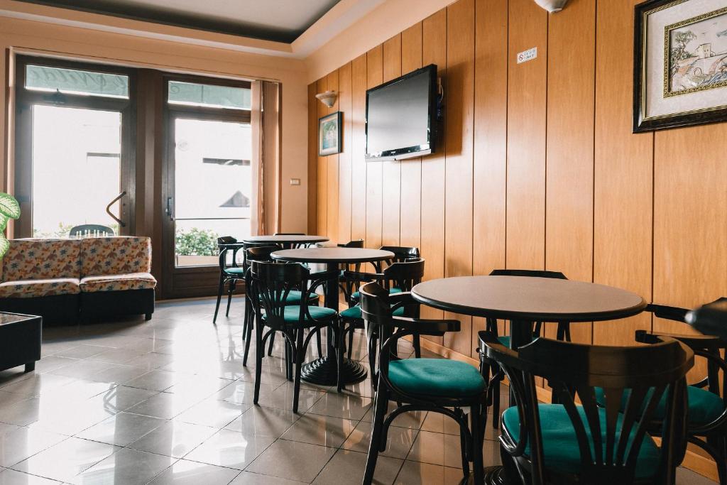 TV a/nebo společenská místnost v ubytování Hotel Nilde