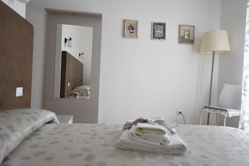 Postel nebo postele na pokoji v ubytování BeB Pignatelli Affittacamere