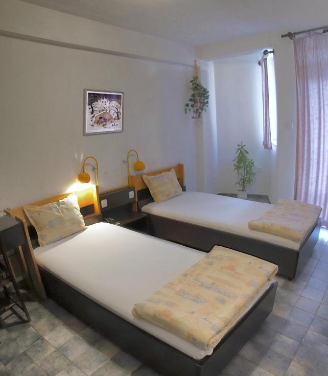 Postel nebo postele na pokoji v ubytování Hotel Balevurov