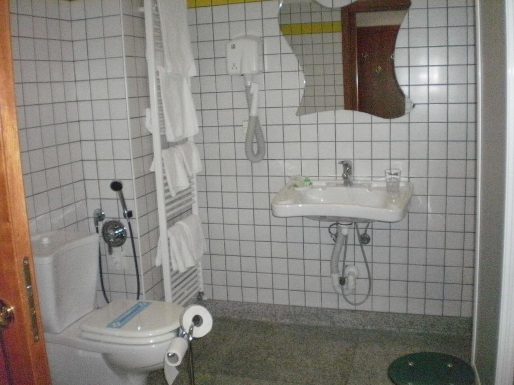 Koupelna v ubytování Hotel Serenella