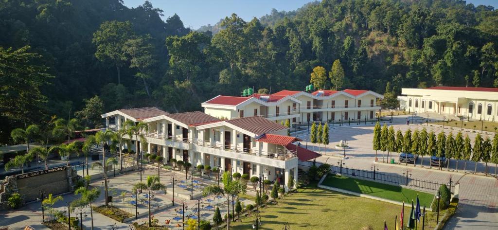 an aerial view of a resort with trees and buildings at Hotel Quick Twenty and Riverside Pvt Ltd in Amlekhganj