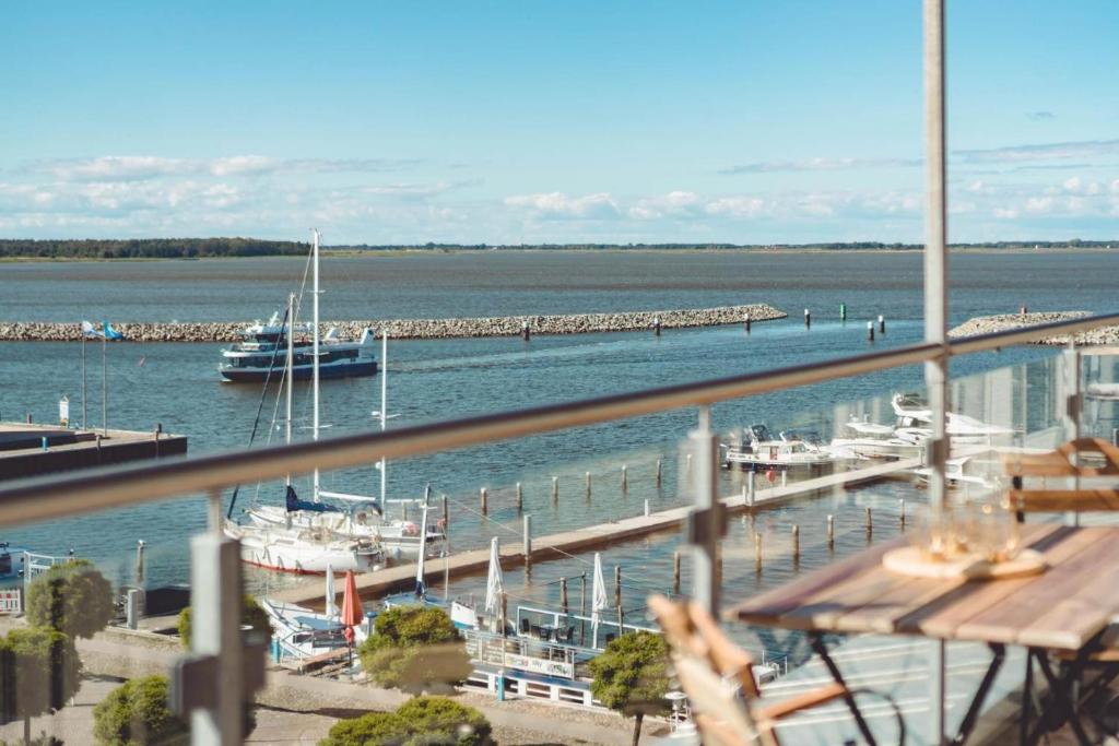 a view of a marina with boats in the water at Penthouse Am Meer Barth in Barth