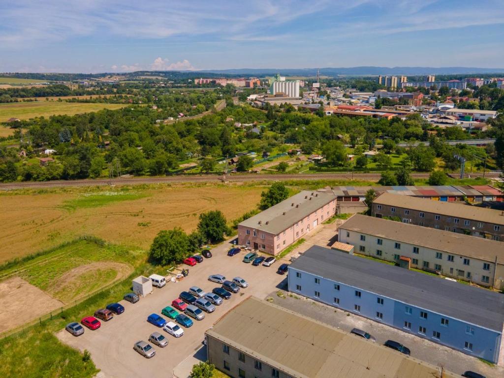 an overhead view of a parking lot with parked cars at Ubytovna Nika in Přerov