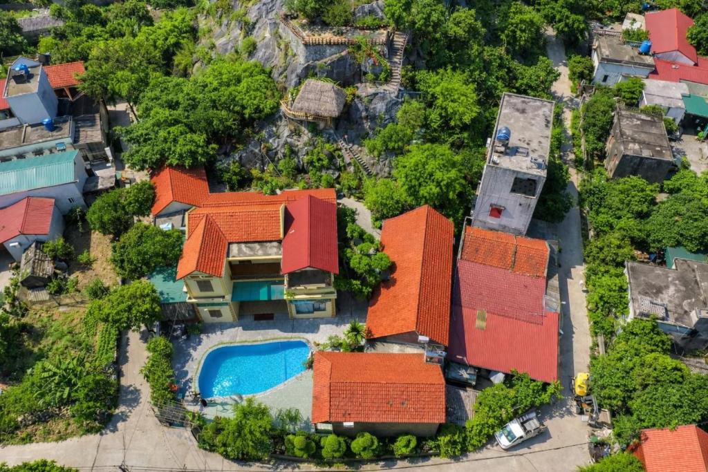 an aerial view of a house with a swimming pool at Trang An ViewPoint Homestay in Ninh Binh
