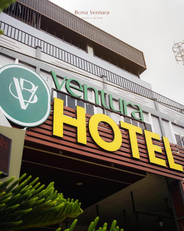 a sign for a vattenfall hotel on a building at Bona Ventura Hotel & Skybar in Tanjung Pinang
