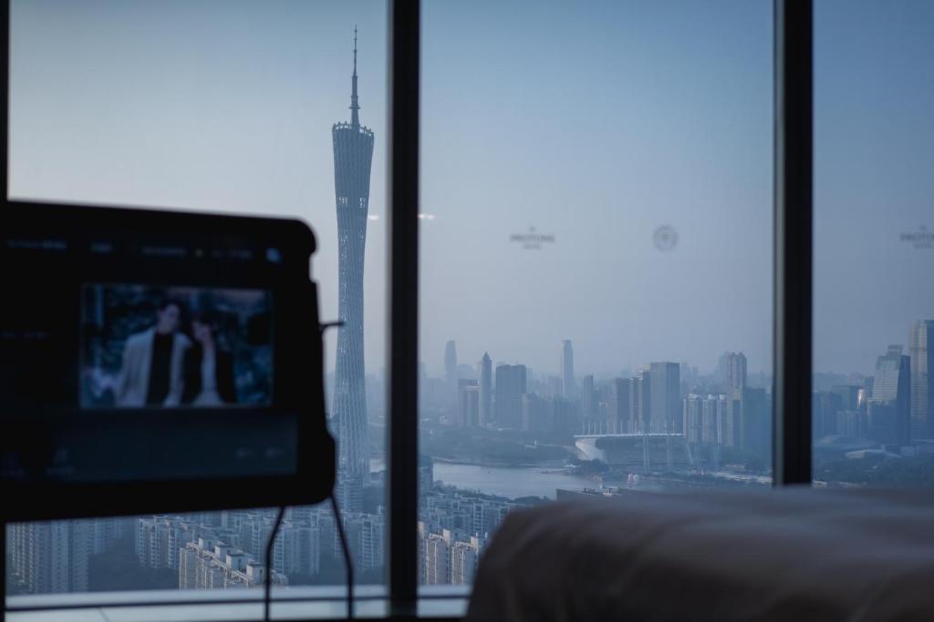 a view of a city skyline from a window at The Protons Guangzhou in Guangzhou