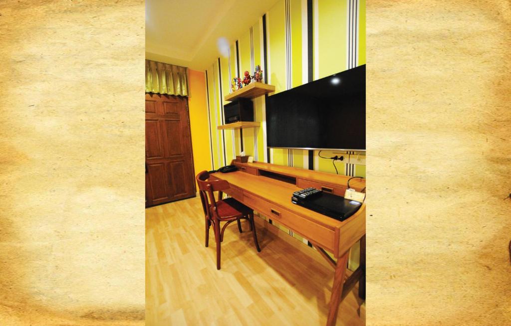 TV a/nebo společenská místnost v ubytování Focal Local Bed & Breakfast
