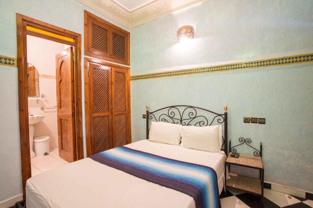 Postel nebo postele na pokoji v ubytování Riad Saad