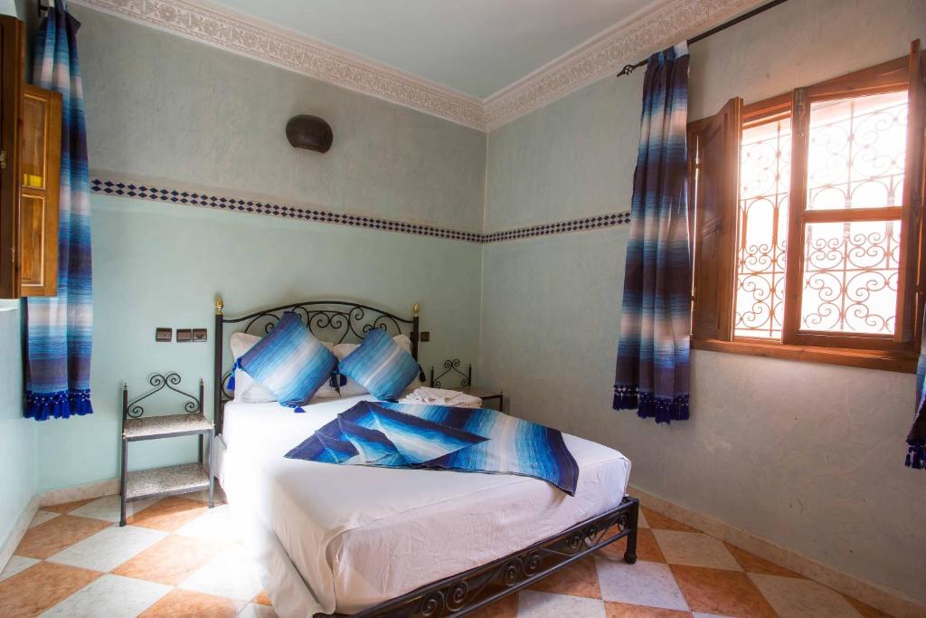 Postel nebo postele na pokoji v ubytování Riad Saad