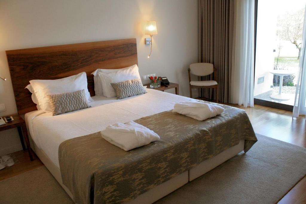 Uma cama ou camas num quarto em Convento Da Serta Hotel